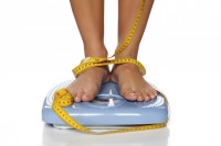 Gewichtstoename door het vasthouden van vocht / Bron: Istock.com/VladimirFLoyd